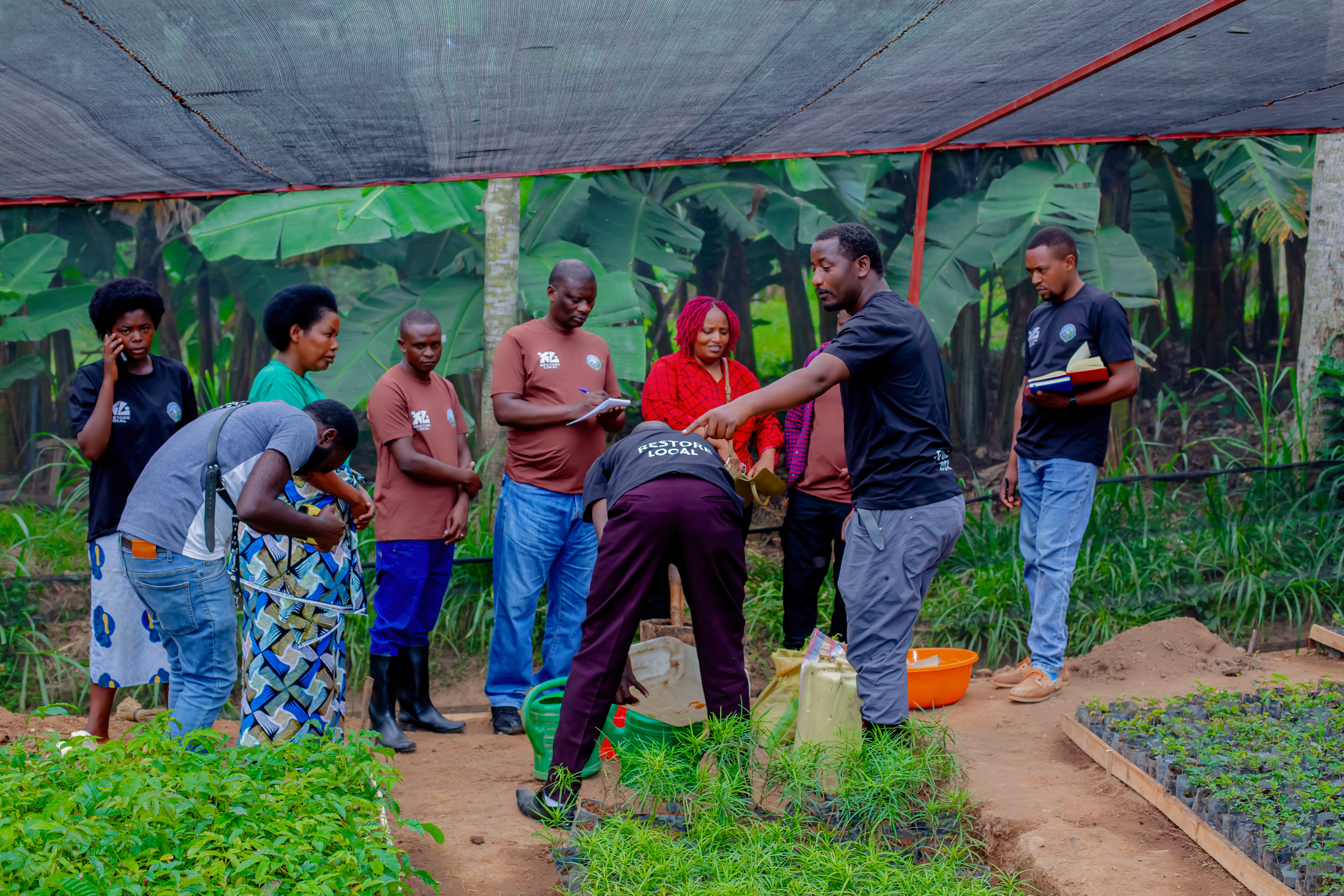 Restoration champions learning how to produce organic pesticides and fertilizers.