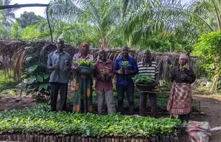 Members of the cooperative during the distribution of coffee seedlings. Photo credit: COCAT